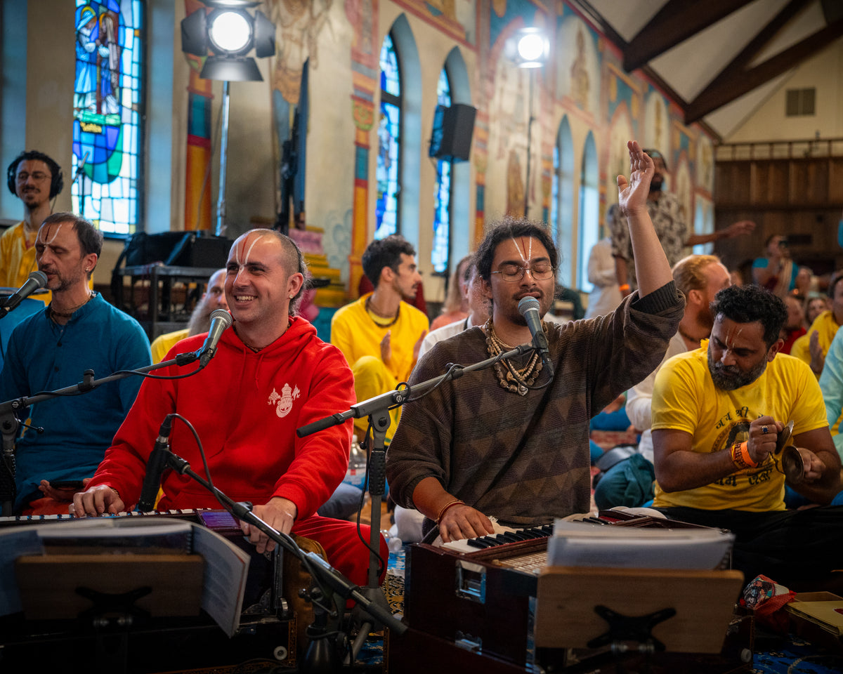 Musicians leading devotional kirtan in the temple