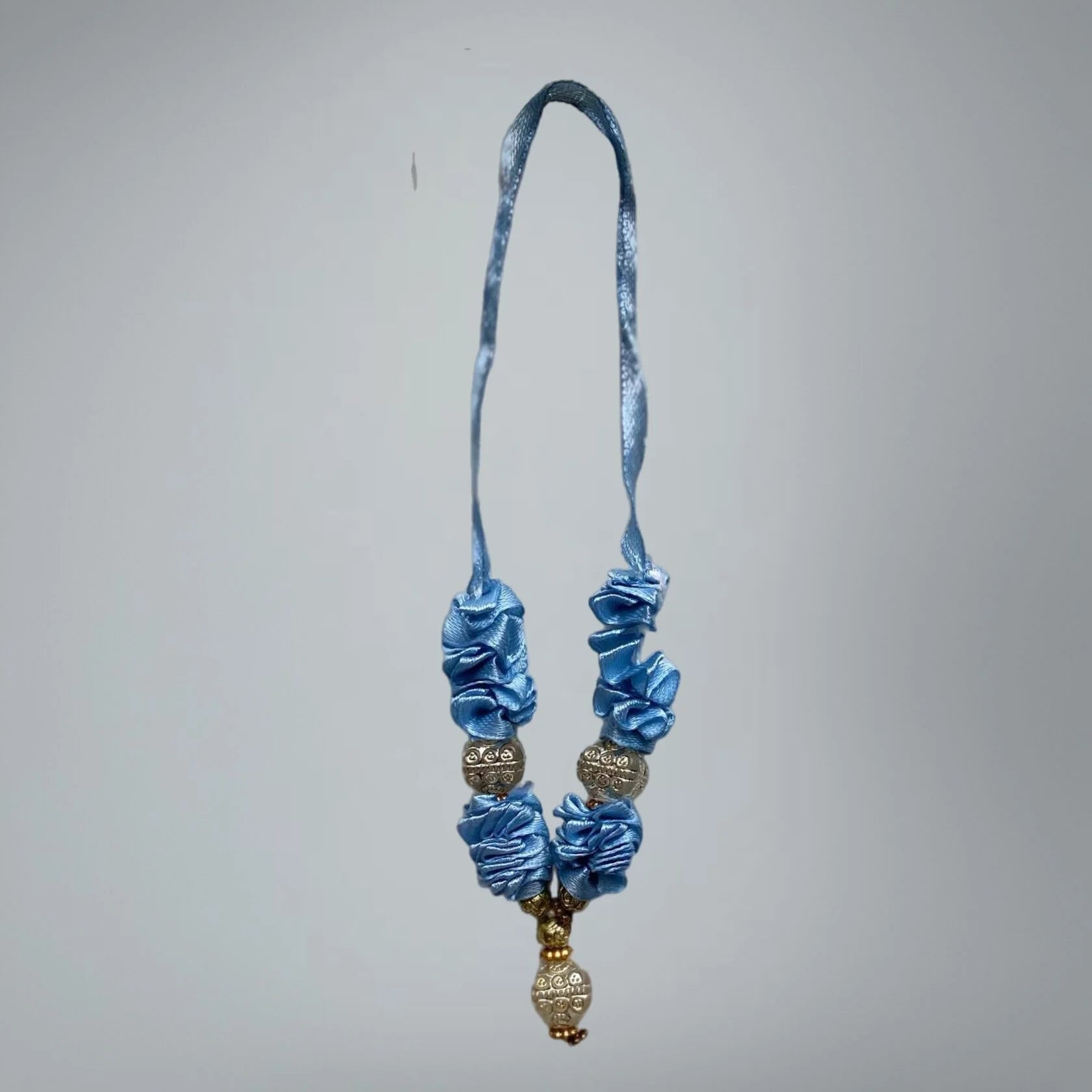Traditional deity garland 8.25 inches on neutral background - Bhakti Shop