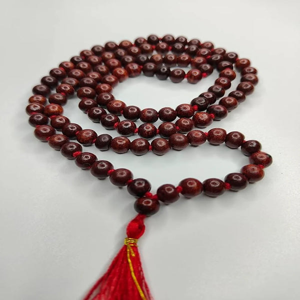 108-bead red wood japa mala on neutral background - Bhakti Shop