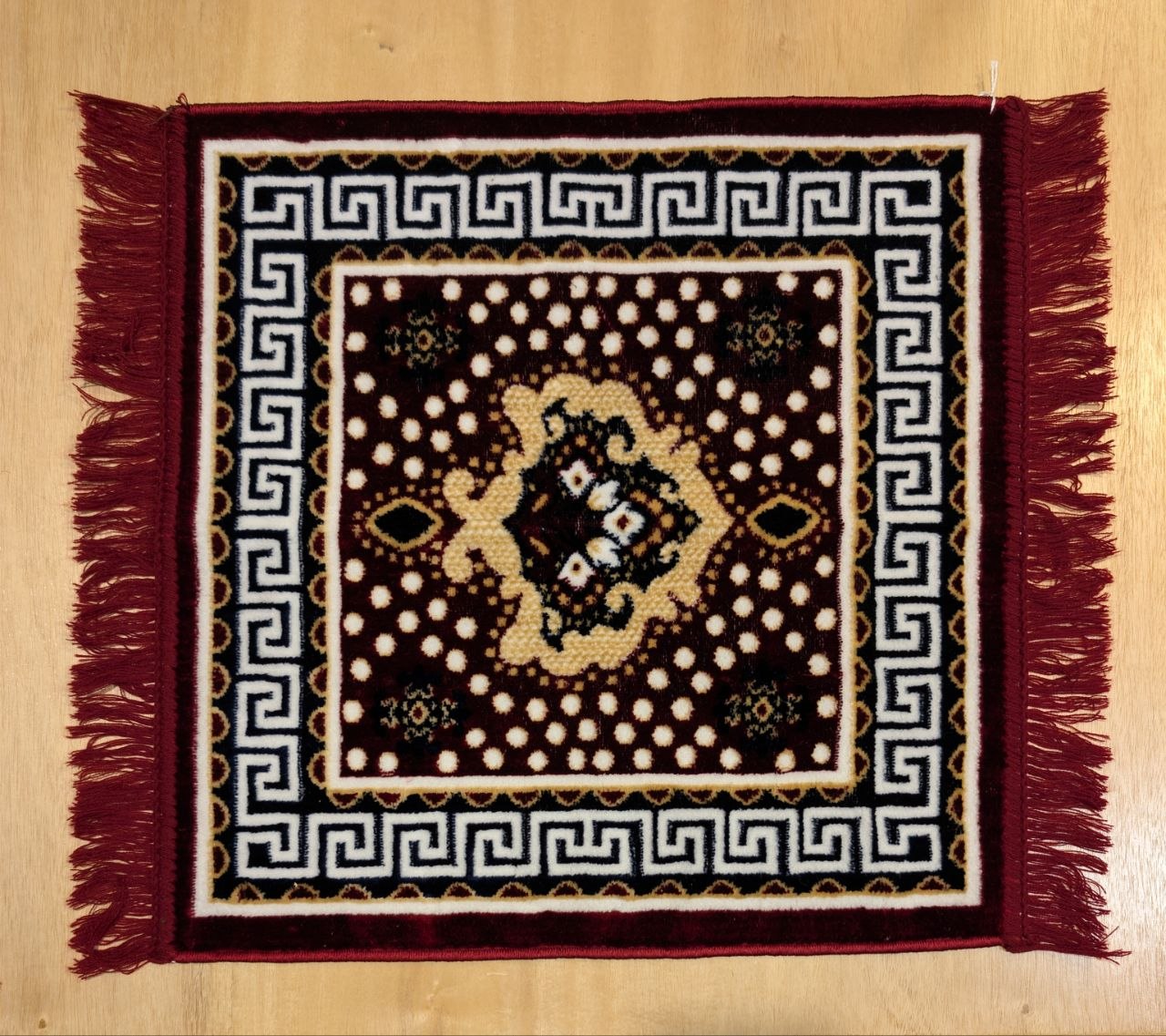 Burgundy meditation carpet with black border and gold medallion center, 20.5 inches square, fringe edges - Bhakti Shop